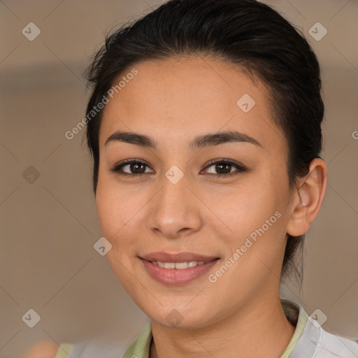 Joyful latino young-adult female with medium  brown hair and brown eyes