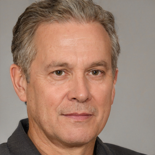 Neutral white middle-aged male with short  gray hair and brown eyes