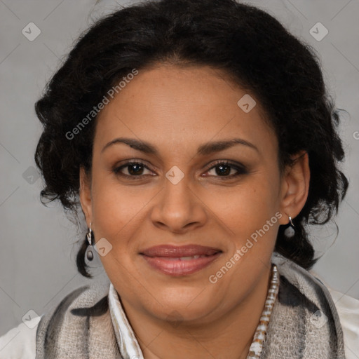 Joyful latino adult female with medium  brown hair and brown eyes