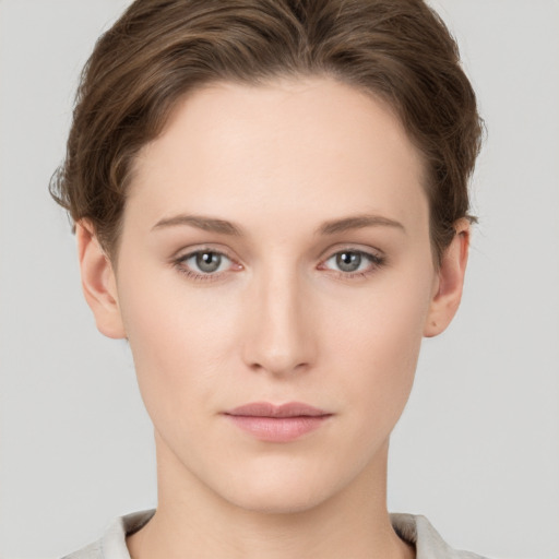 Neutral white young-adult female with short  brown hair and brown eyes