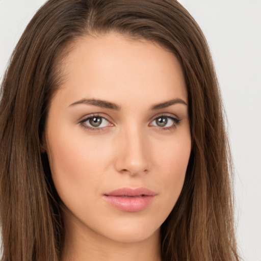 Neutral white young-adult female with long  brown hair and brown eyes