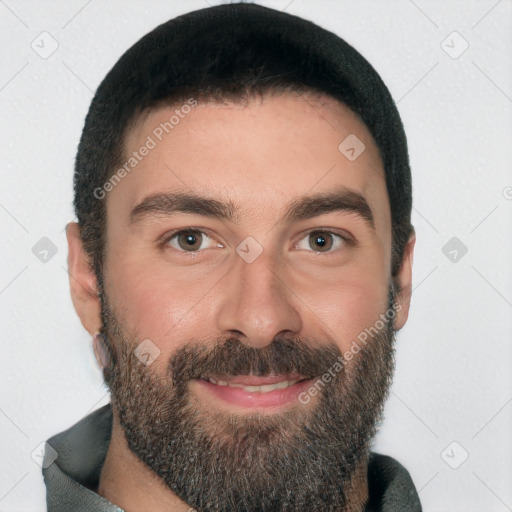 Joyful white young-adult male with short  black hair and brown eyes