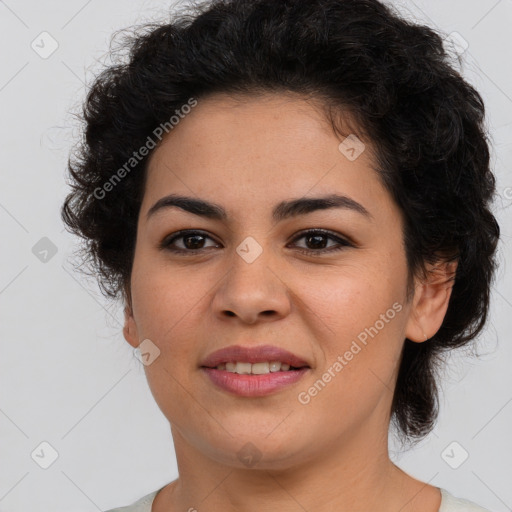 Joyful latino young-adult female with short  brown hair and brown eyes