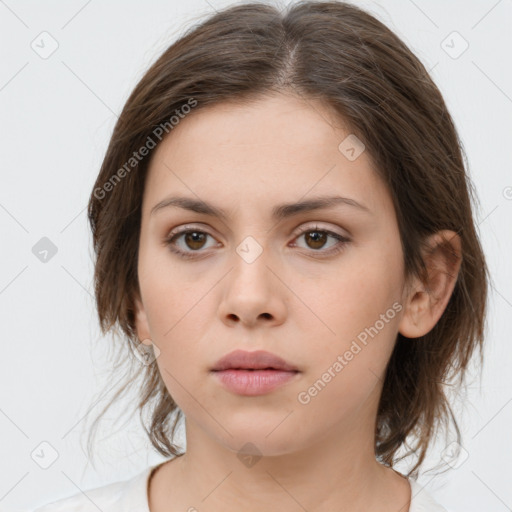 Neutral white young-adult female with medium  brown hair and brown eyes