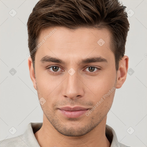 Neutral white young-adult male with short  brown hair and brown eyes