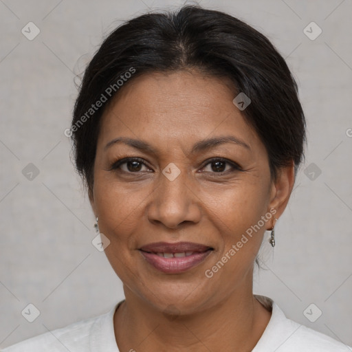 Joyful white adult female with short  brown hair and brown eyes