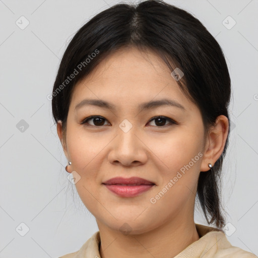 Joyful asian young-adult female with medium  brown hair and brown eyes