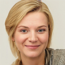 Joyful white young-adult female with medium  brown hair and blue eyes