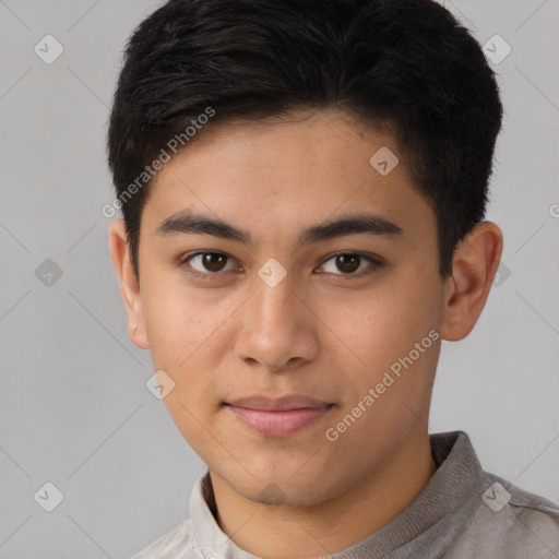 Joyful latino young-adult male with short  brown hair and brown eyes