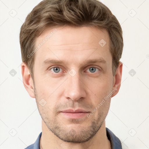 Neutral white young-adult male with short  brown hair and grey eyes