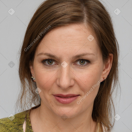 Joyful white young-adult female with medium  brown hair and grey eyes