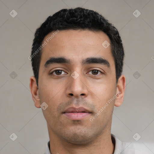 Neutral latino young-adult male with short  black hair and brown eyes