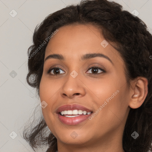 Joyful latino young-adult female with long  brown hair and brown eyes