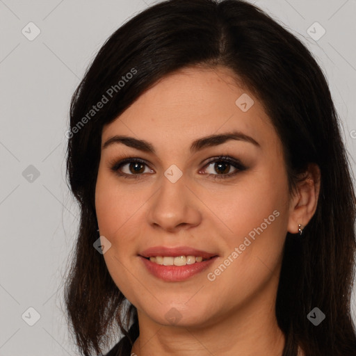 Joyful white young-adult female with long  brown hair and brown eyes