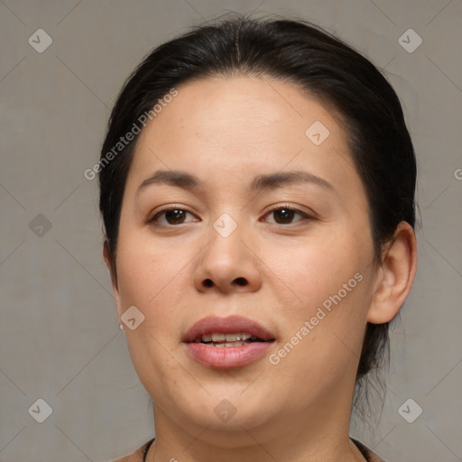 Joyful asian young-adult female with medium  brown hair and brown eyes