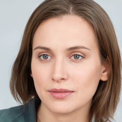 Neutral white young-adult female with medium  brown hair and grey eyes