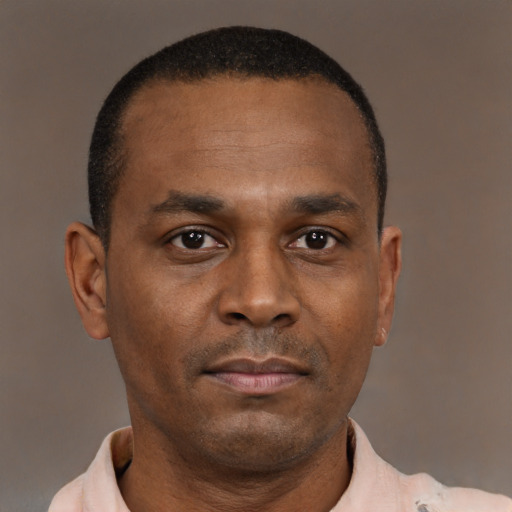 Neutral black adult male with short  brown hair and brown eyes