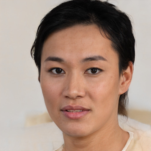 Neutral white young-adult female with short  black hair and brown eyes