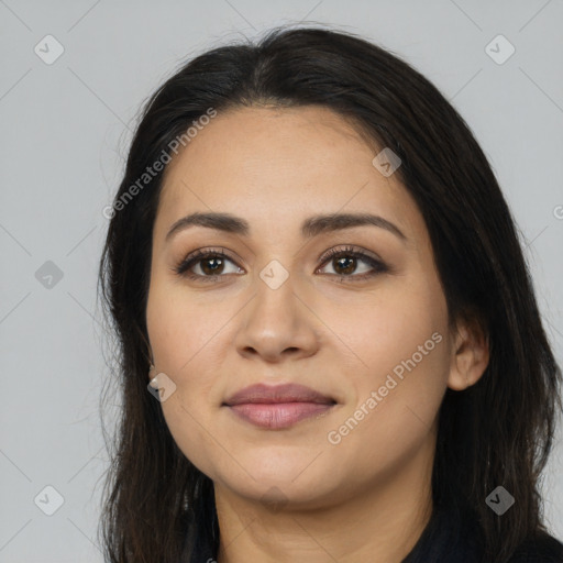 Joyful latino young-adult female with long  black hair and brown eyes