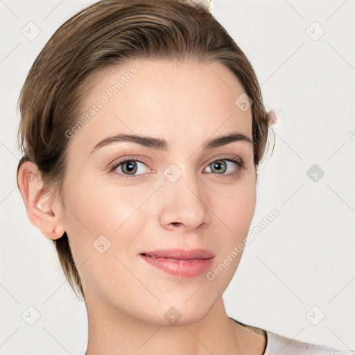 Joyful white young-adult female with medium  brown hair and grey eyes