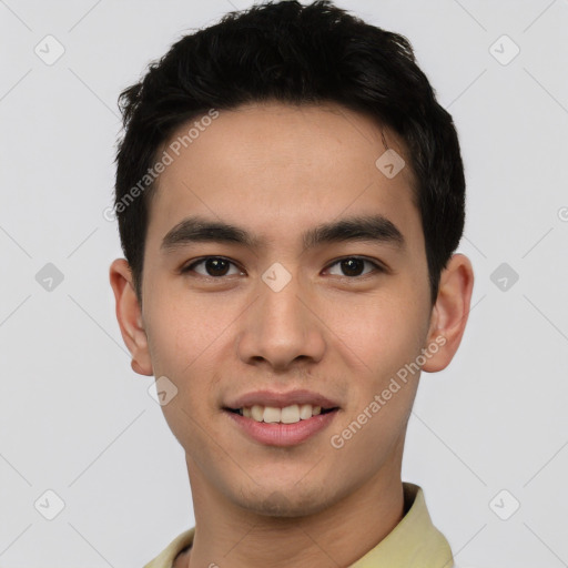 Joyful asian young-adult male with short  black hair and brown eyes