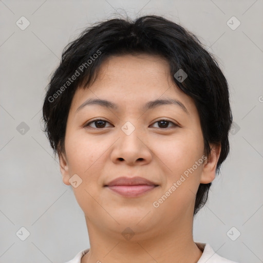 Joyful asian young-adult female with short  brown hair and brown eyes