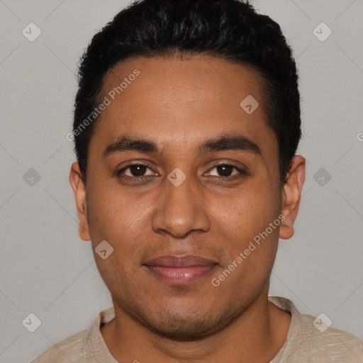 Joyful latino young-adult male with short  black hair and brown eyes