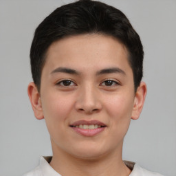 Joyful asian young-adult female with short  brown hair and brown eyes