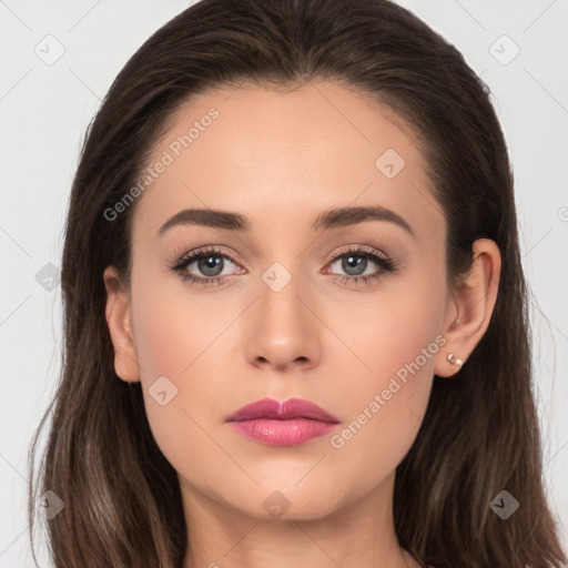 Neutral white young-adult female with long  brown hair and brown eyes