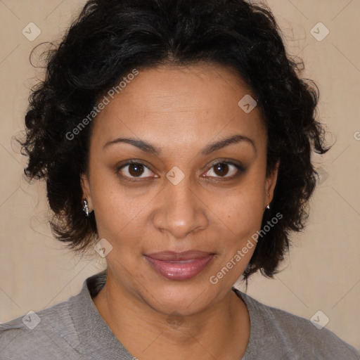 Joyful black adult female with medium  brown hair and brown eyes