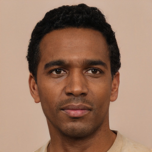 Neutral black young-adult male with short  black hair and brown eyes