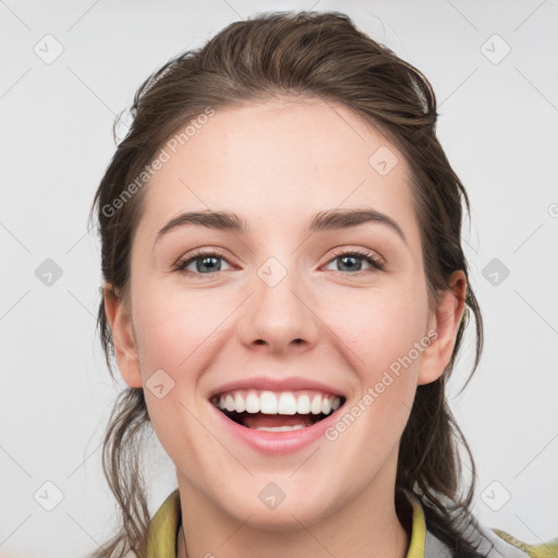 Joyful white young-adult female with medium  brown hair and grey eyes