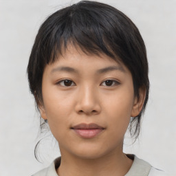 Neutral asian young-adult female with medium  brown hair and brown eyes