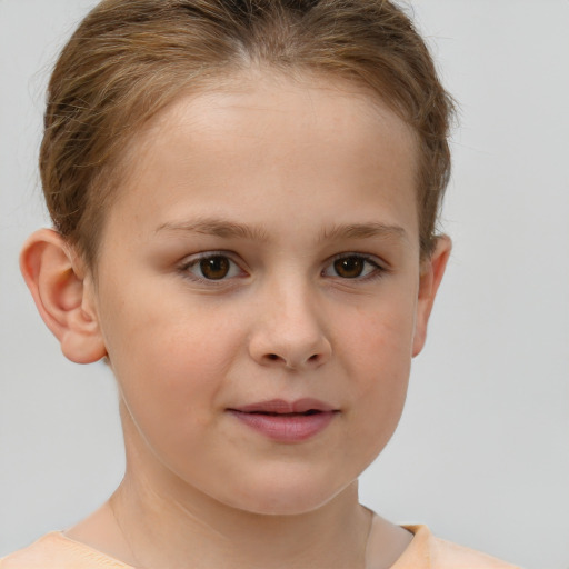 Joyful white child female with short  brown hair and brown eyes