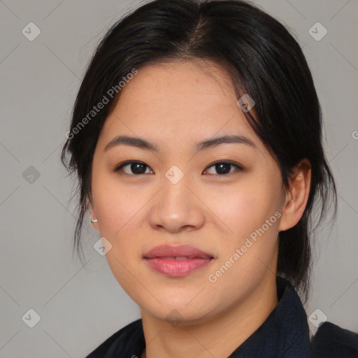 Joyful asian young-adult female with medium  black hair and brown eyes