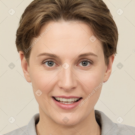 Joyful white young-adult female with short  brown hair and grey eyes