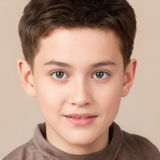 Joyful white child male with short  brown hair and brown eyes