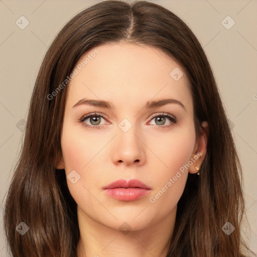 Neutral white young-adult female with long  brown hair and brown eyes