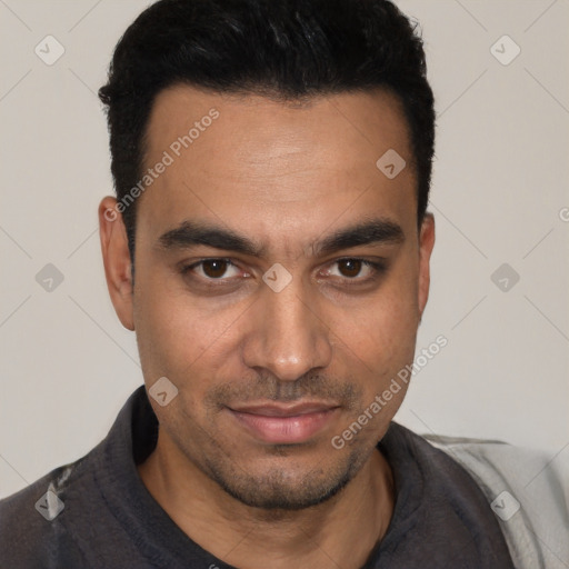 Joyful white young-adult male with short  black hair and brown eyes