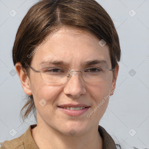 Joyful white adult female with medium  brown hair and grey eyes