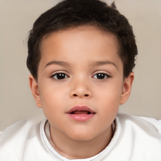 Joyful white child female with short  brown hair and brown eyes