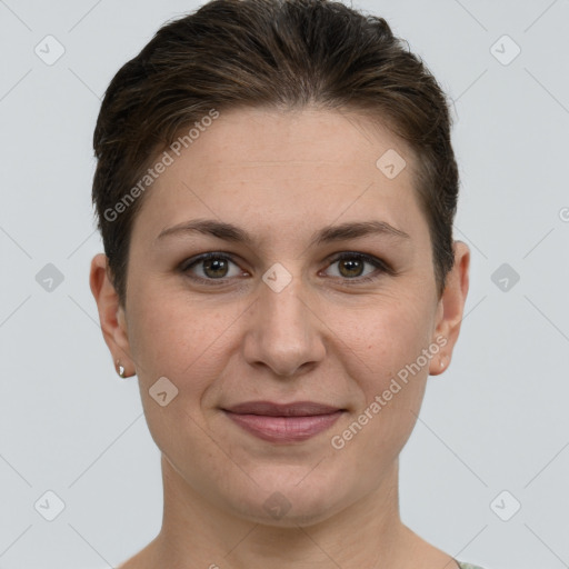 Joyful white adult female with short  brown hair and grey eyes