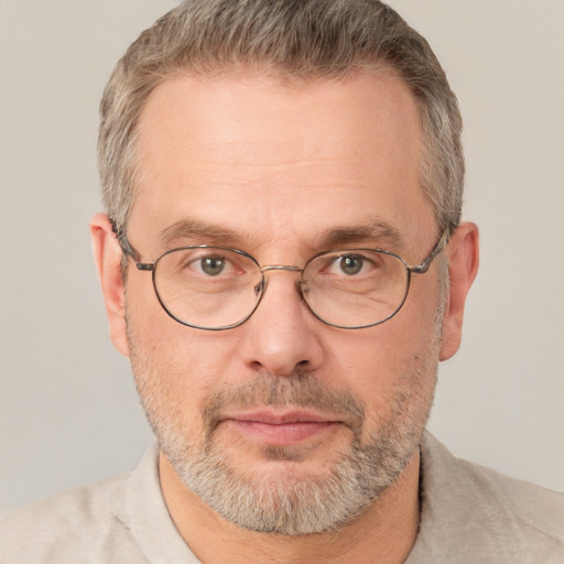 Neutral white middle-aged male with short  brown hair and brown eyes