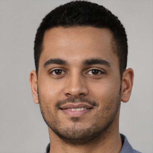 Neutral latino young-adult male with short  brown hair and brown eyes
