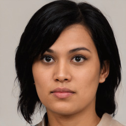 Neutral asian young-adult female with medium  black hair and brown eyes