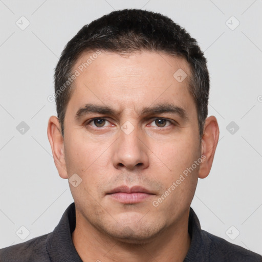Neutral white young-adult male with short  black hair and brown eyes
