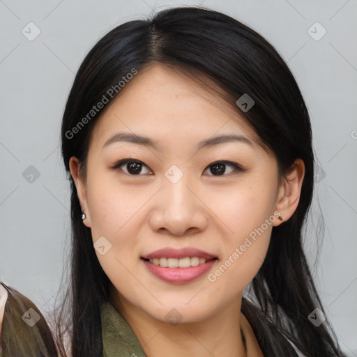 Joyful asian young-adult female with long  brown hair and brown eyes