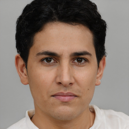 Neutral asian young-adult male with short  brown hair and brown eyes