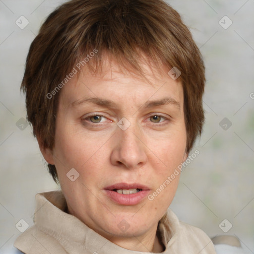 Joyful white adult female with medium  brown hair and grey eyes