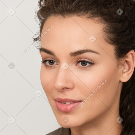 Neutral white young-adult female with long  brown hair and brown eyes